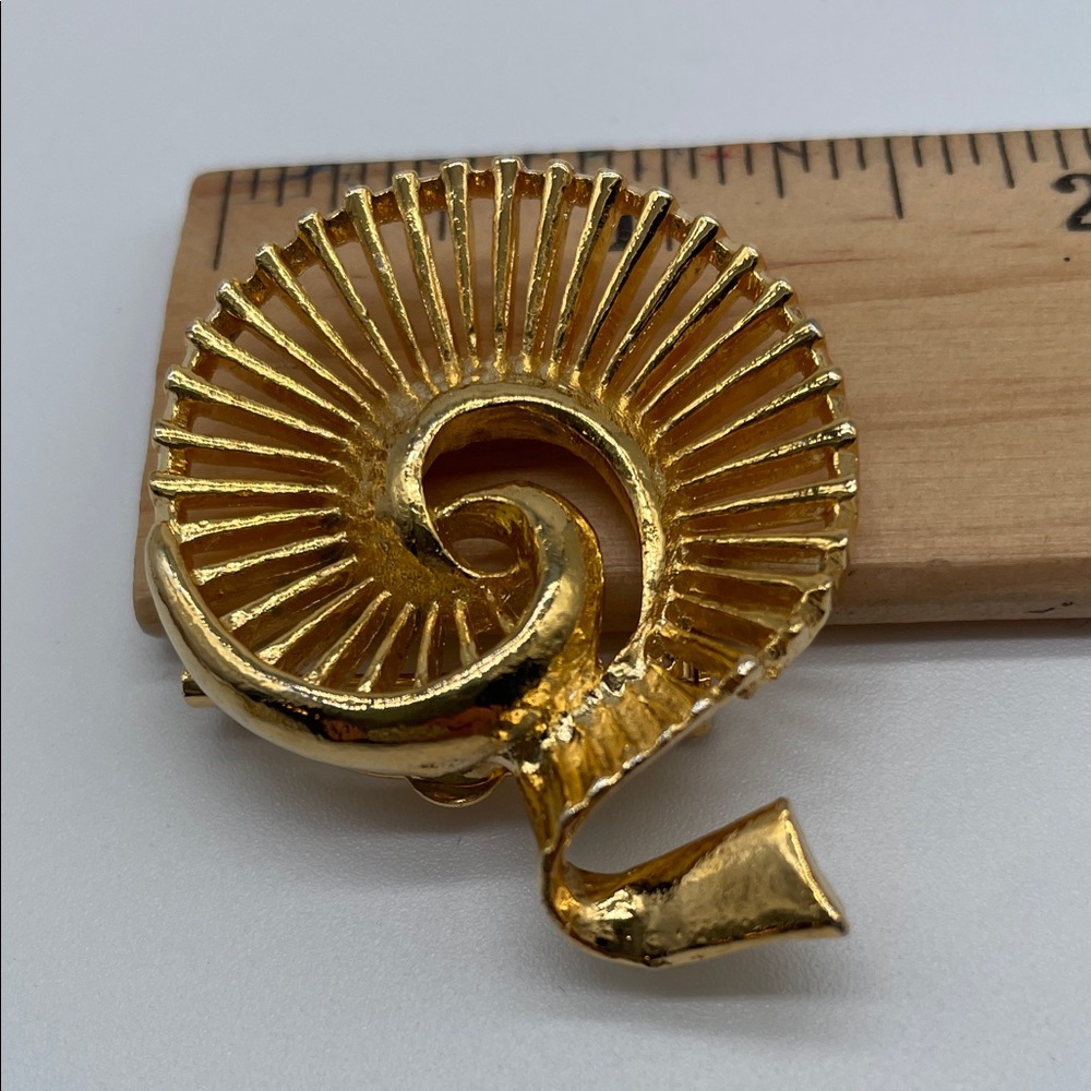 Elegant Gold Spiral Brooch